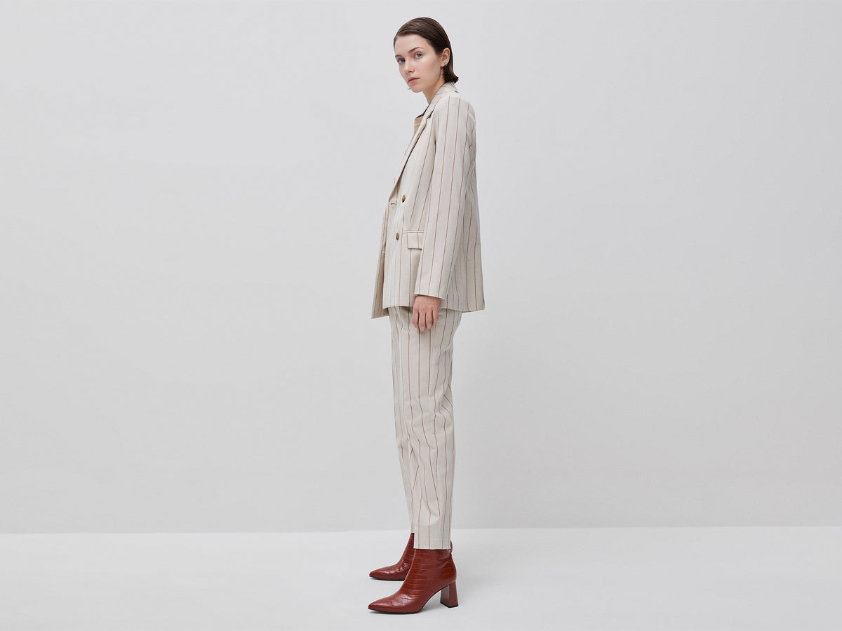 Carrot-fit pinstriped trousers