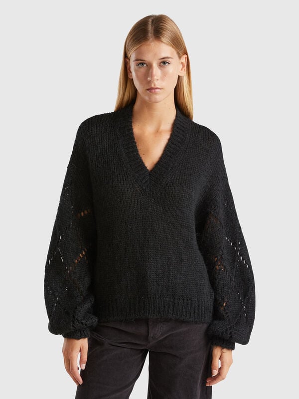 Sweater with perforated sleeve Women