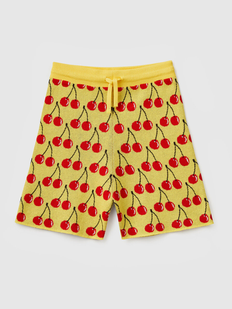 Yellow bermudas with cherry pattern