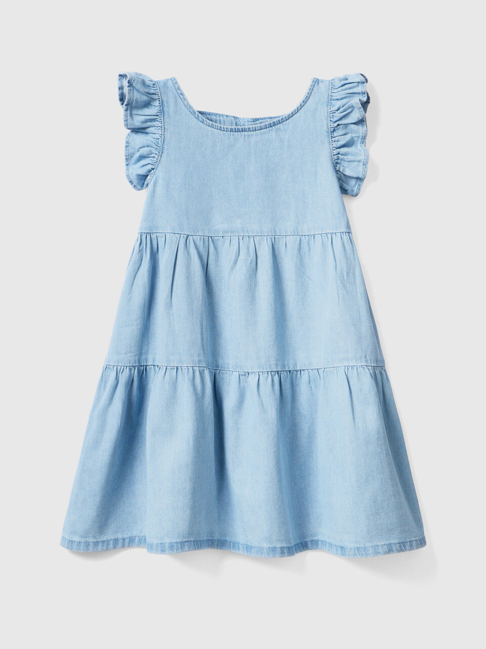 Dress with ruffles and frills