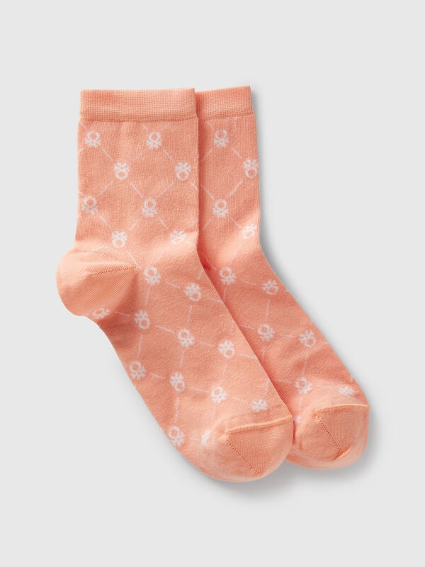 Pink socks with logos
