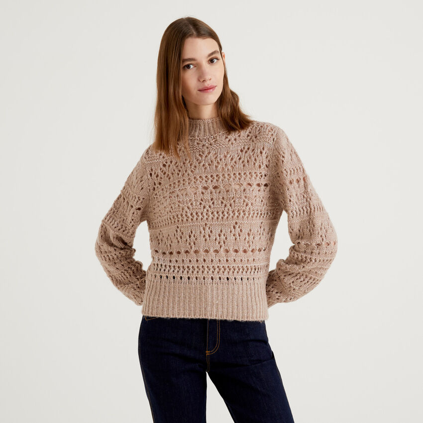 Sweater with perforated knit