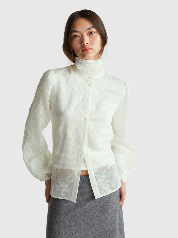 Embroidered blouse with ruffled collar Women