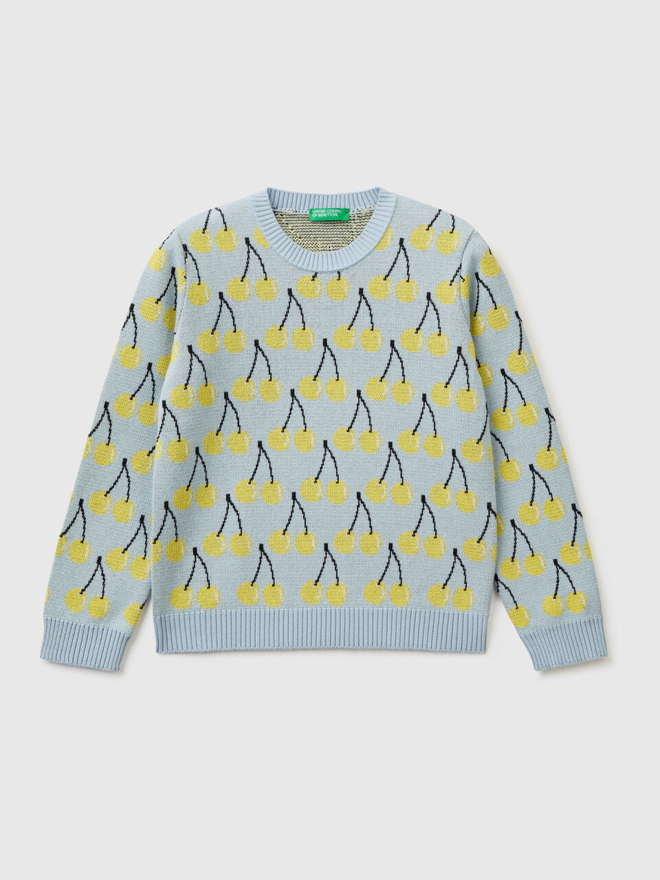 Sky blue sweater with cherry pattern