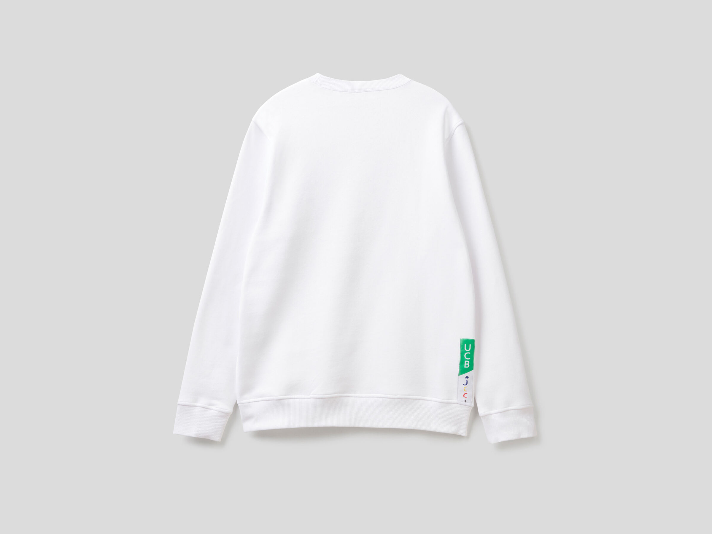 JCCxUCB warm hoodie with graphic image number 6