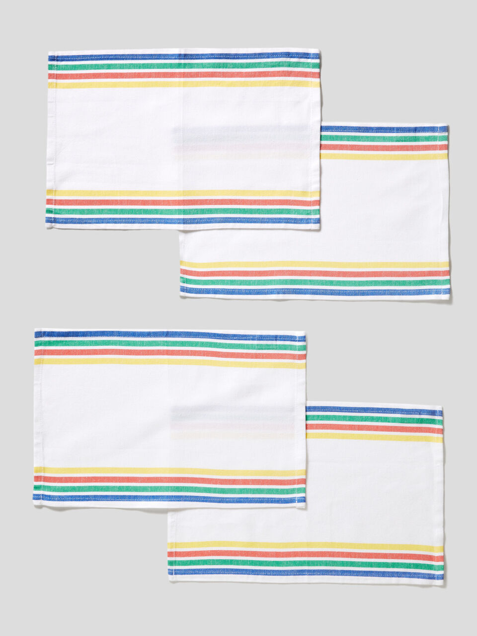 Four placemats with multicolor stripes image number 1